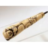 A c.1900 Japanese ivory parasol handle