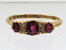 An 18ct gold ruby & diamond ring