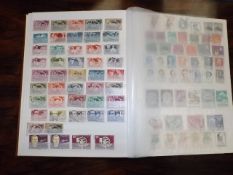 A large album of world stamps