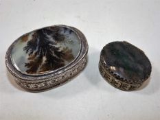 A silver moss agate mounted box, damage to hinge twinned with white metal box with agate top