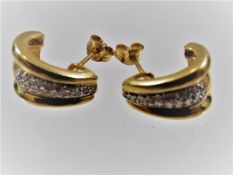 A pair of 18ct gold & diamond ear rings