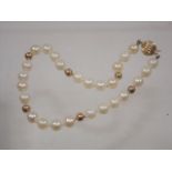 A cultured pearl bracelet with gold fittings