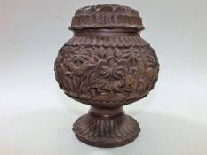 A brass lined carved Indian jar & cover