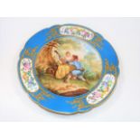 A 19thC. Sevres porcelain plate signed Watteau