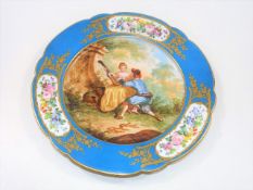 A 19thC. Sevres porcelain plate signed Watteau