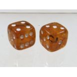 A set of baltic amber dice