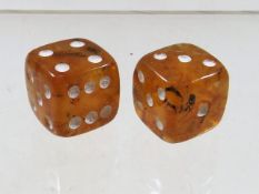 A set of baltic amber dice