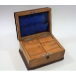 An antique ash tea caddy