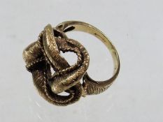 A 9ct gold knot ring