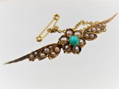 A Victorian gold & natural pearl brooch