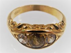 A Victorian yellow metal ring set with two white d
