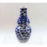 A Chinese blue & white double gourd vase with four