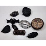 A Japanese porcelain brooch, mourning brooches & o