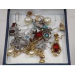 A small box of ear rings & other items