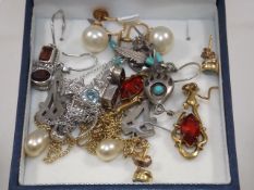 A small box of ear rings & other items