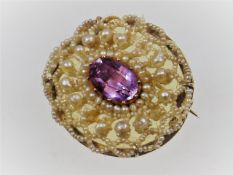 A 19thC. brooch set with natural pearl & amethyst