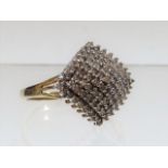A 9ct gold diamond cluster ring