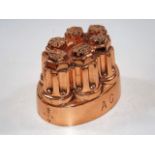 A Victorian copper jelly mould