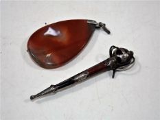 A silver mounted agate brooch twinned with an agat