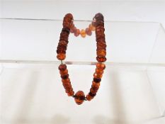 A set of Victorian faceted amber beads