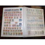 A large album of world stamps