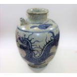 A c.1600 Chinese Ming Dynasty wine vessel with dra