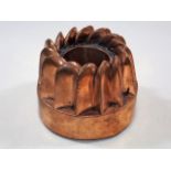 A Victorian copper jelly mould