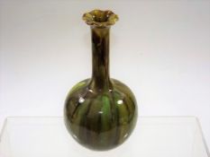 A green glazed Burmantofts vase