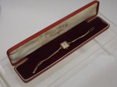 A ladies Rotary gold wrist watch