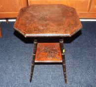 A Small Occasional Table With Carved Top