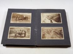 An early 20thC. wartime album of photographs inclu