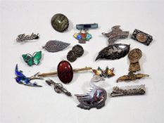 A boxed quantity of brooches & sundries