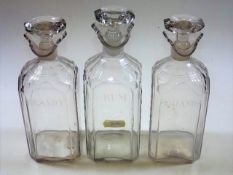 Three 19thC. decanters with faceted shoulders, etc