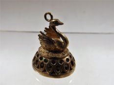 A yellow metal Victorian seal