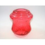 An Edwardian cranberry glass oil lamp shade