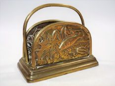 A c.1890 brass arts & crafts letter rack