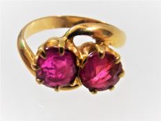 A yellow metal ring set with approx. two carats of