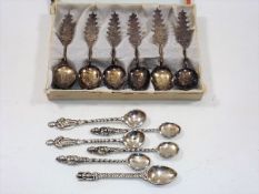 Six silver Chinese spoons twinned with five others