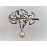 A French art nouveau 18ct gold brooch set with diamonds & pear