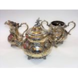 A Victorian silver plated tea set with nesting bir
