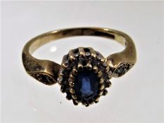 A US 10k gold sapphire & diamond ring