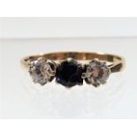 A ladies 9ct gold three stone ring