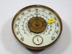 A Jaeger brass barometer