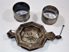 A silver Walker & Hall tea strainer twinned with t