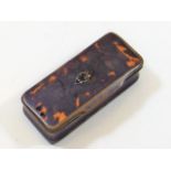 A 19thC. tortoiseshell snuff box