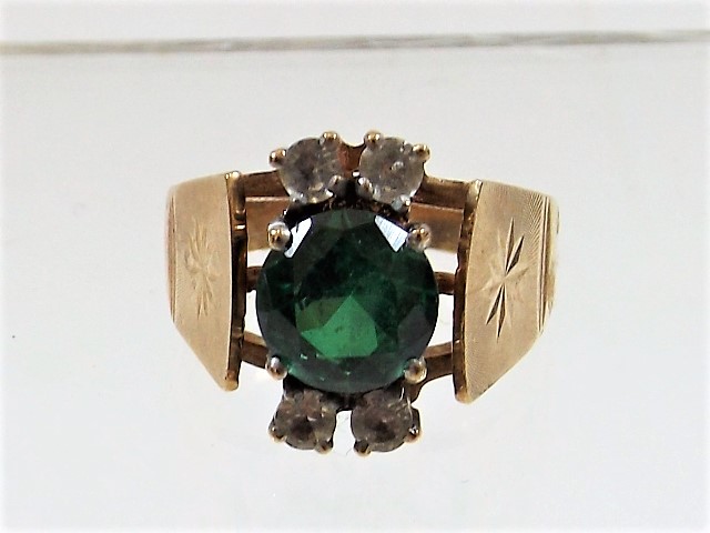 A 9ct gold ring set with green & white stones