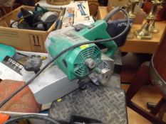A Hitachi belt sander & tool box