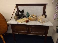 An Edwardian wash stand with marble top