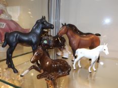 Four Beswick horses, one similar Coopercraft & a M