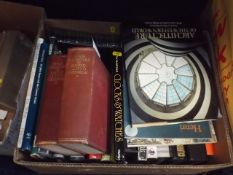 A boxed quantity of various books